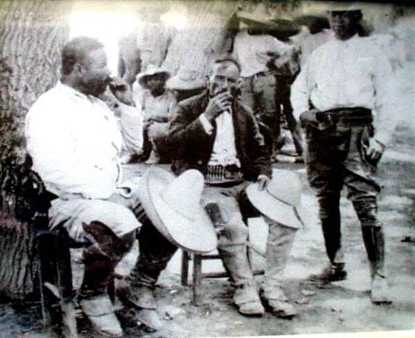 In the centre, Jose Doroteo Arango Arámbula, “Pancho Villa”, enjoying a marijuana cigarette